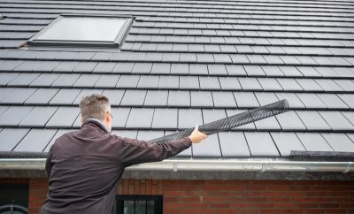 Professional Installing Gutter Covers